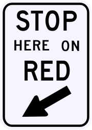 Stop Here On Red Sign